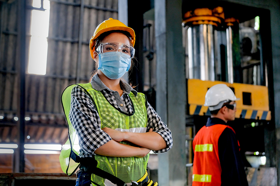 Factory Woman Worker Or Technician With Hygienic Mask Stand With